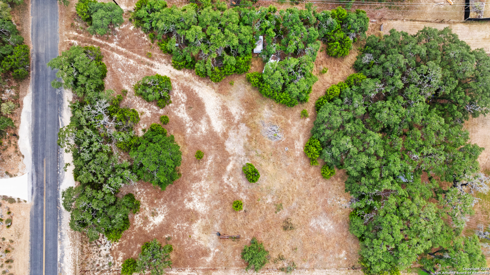 32311 Koch Road Bulverde, TX 78163 - Photo 10 of 14 an aerial view of a house with a yard