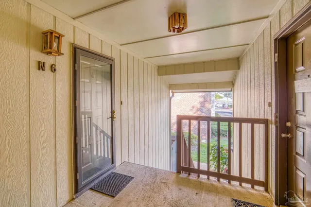 a view of a bathroom with a glass door