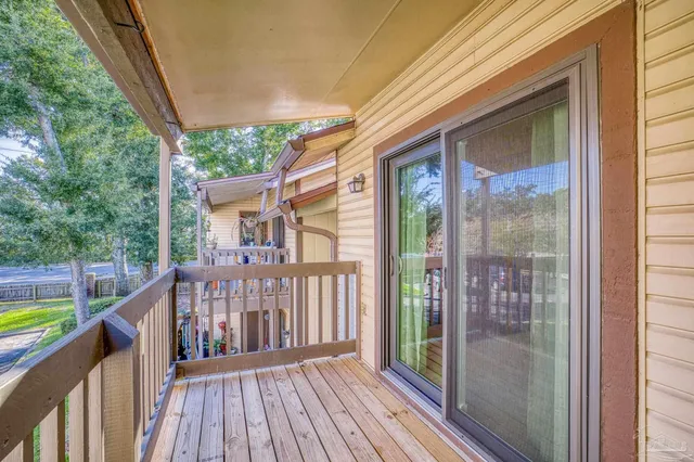 a view of a house with a yard and plants