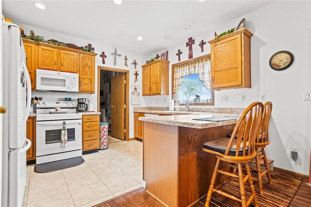 4222 Ramsey Road Springfield, OH 45502 - Photo 40 of 79 Bright and inviting kitchen with practical design and warm wood cabinetry.