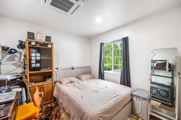a kitchen with stainless steel appliances granite countertop a refrigerator a stove top oven a sink and dishwasher