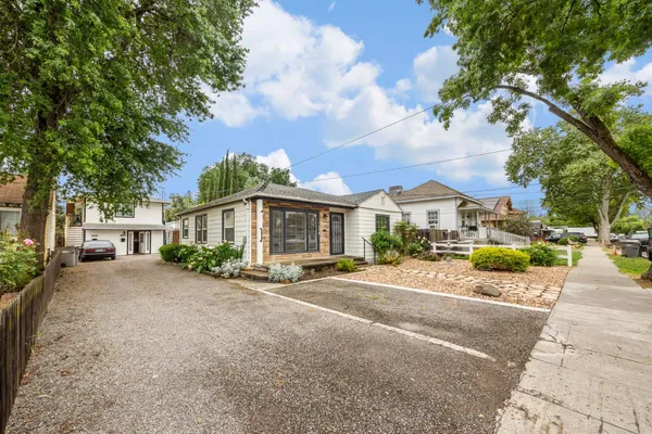 a view of a house with a street