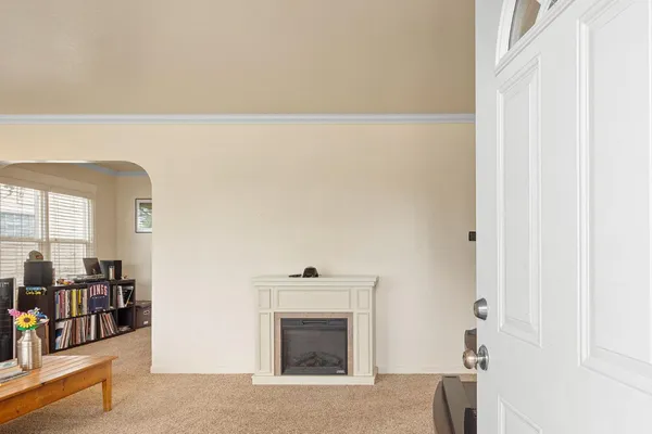 a living room with furniture and a window