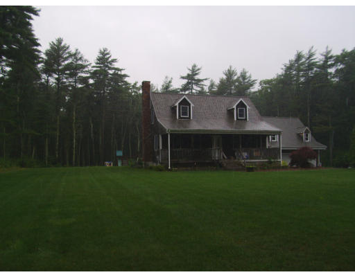 155 Neck Road Rochester, MA 02770 - Photo 8 of 8 a view of a big house with a big yard and large trees