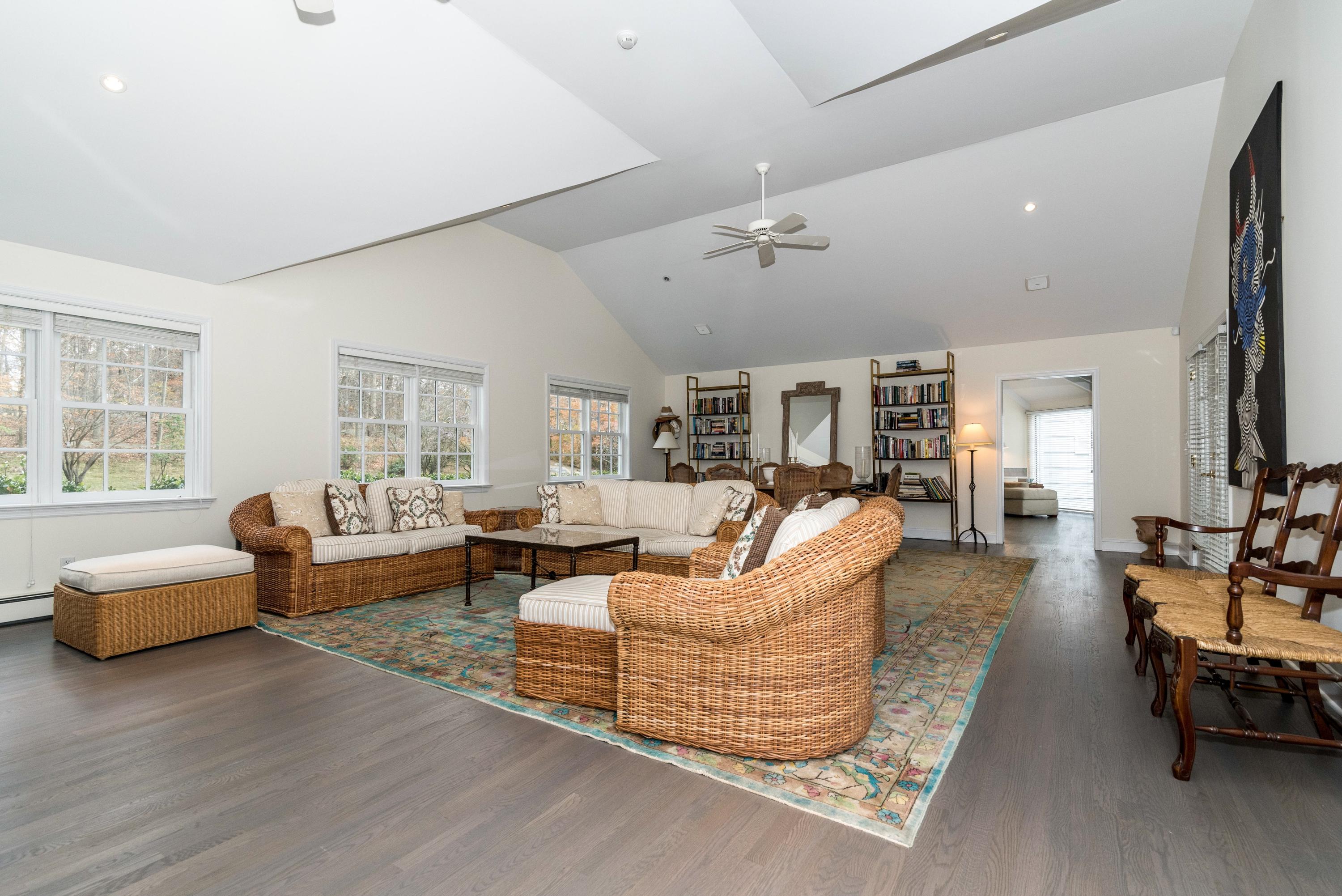 782 Smith Ridge Road New Canaan, CT 06840 - Photo 12 of 25 a living room with furniture and wooden floor