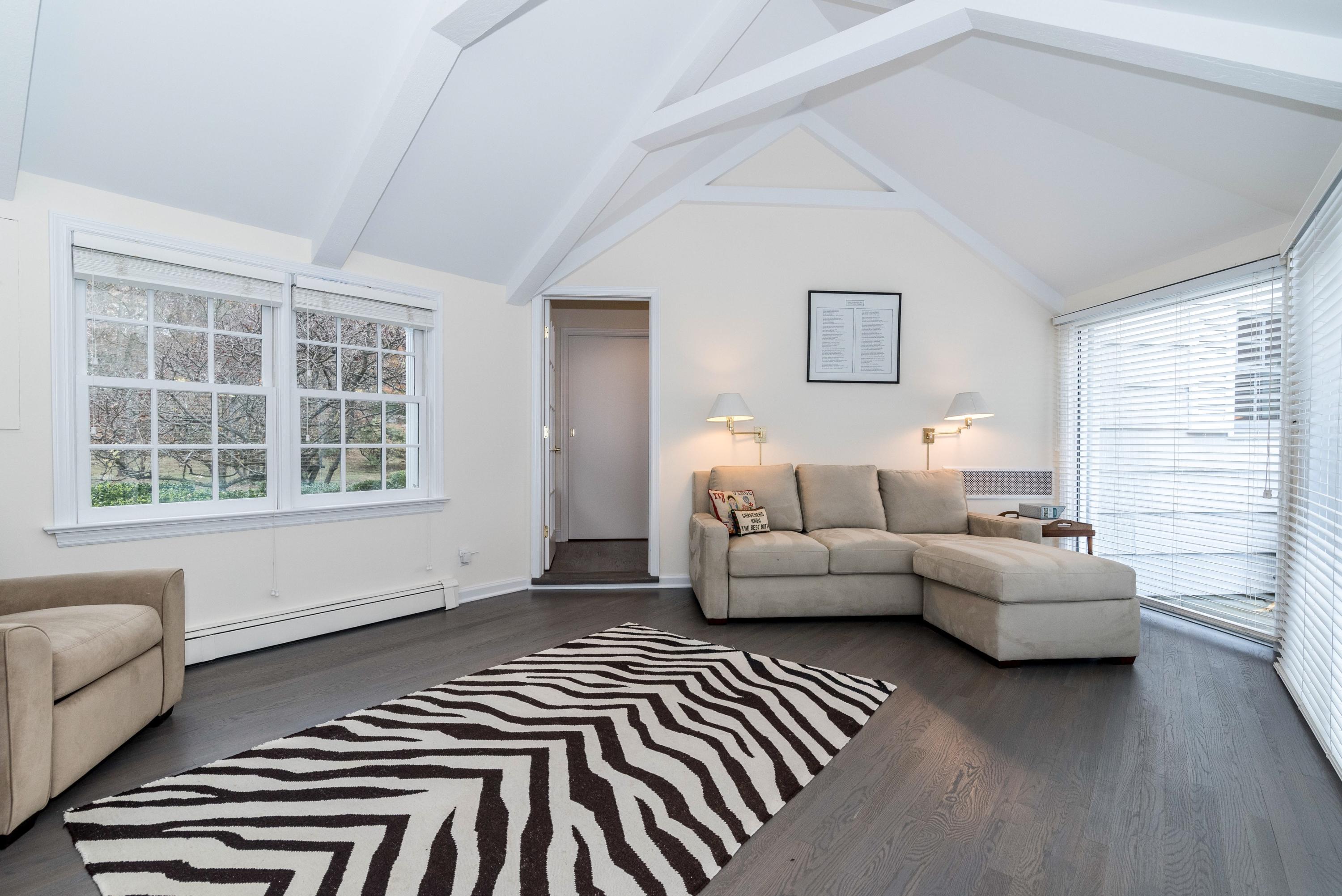 782 Smith Ridge Road New Canaan, CT 06840 - Photo 13 of 25 a living room with furniture and a window