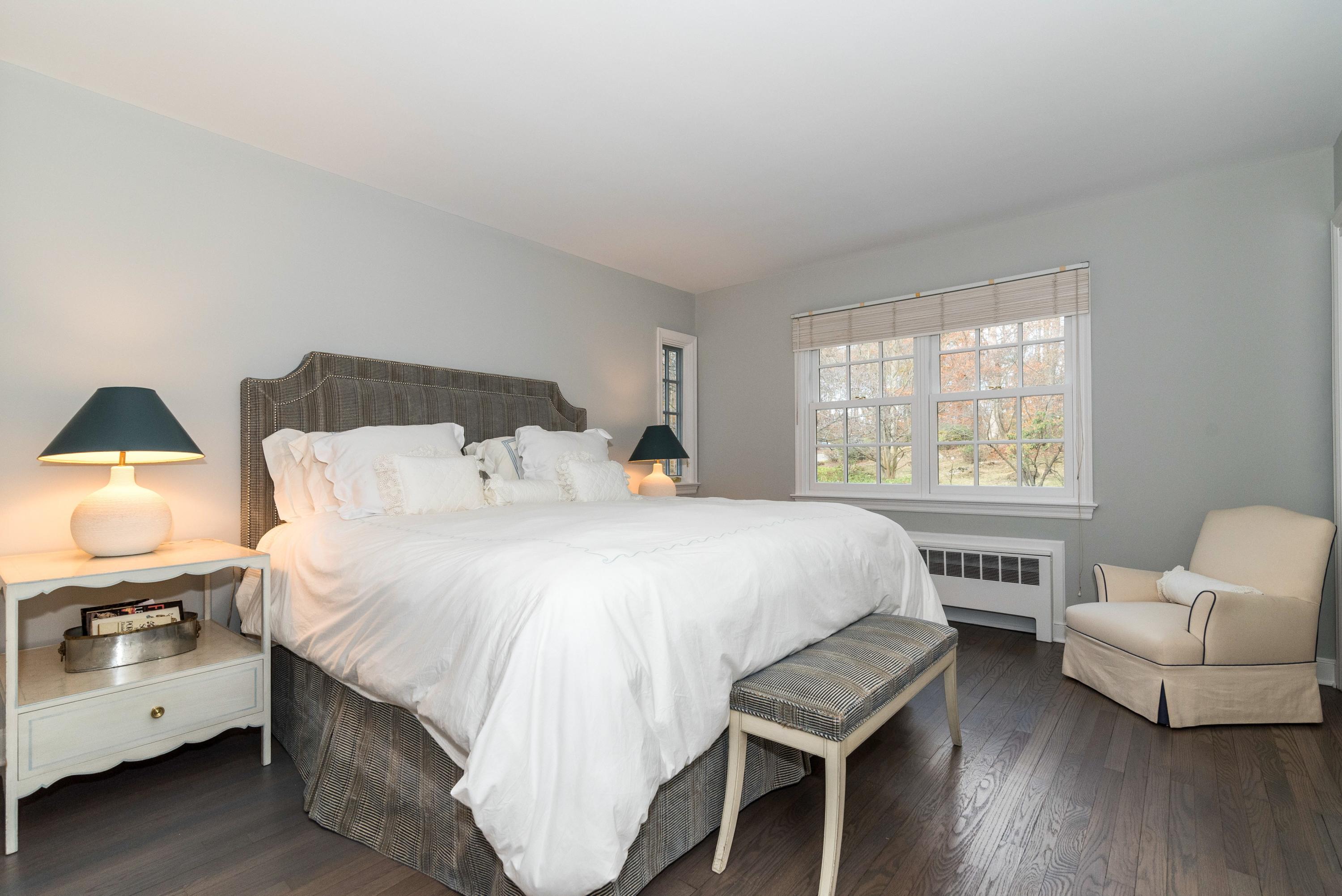 782 Smith Ridge Road New Canaan, CT 06840 - Photo 15 of 25 a bedroom with a bed and a couch