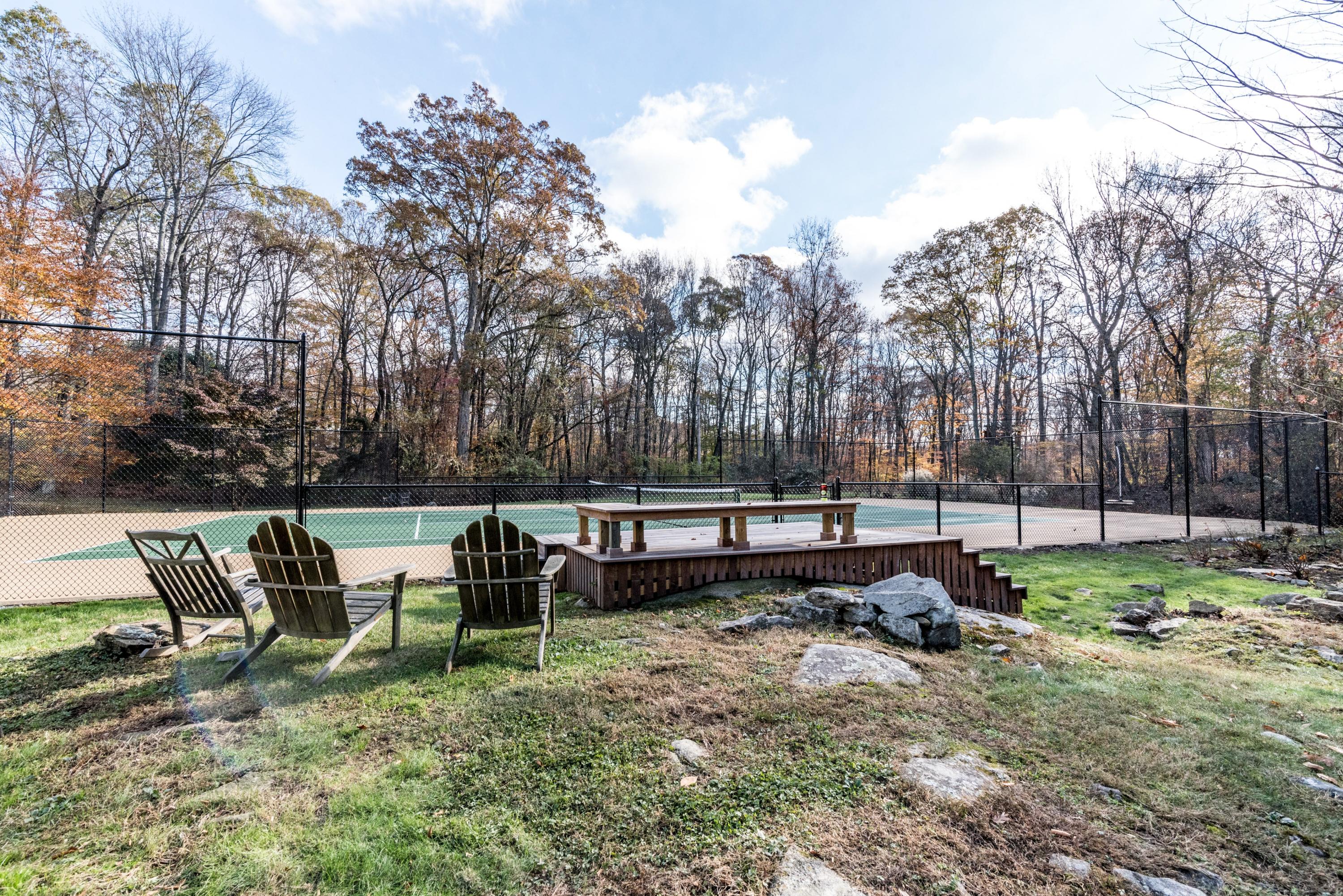 782 Smith Ridge Road New Canaan, CT 06840 - Photo 24 of 25 a view of backyard with wooden fence