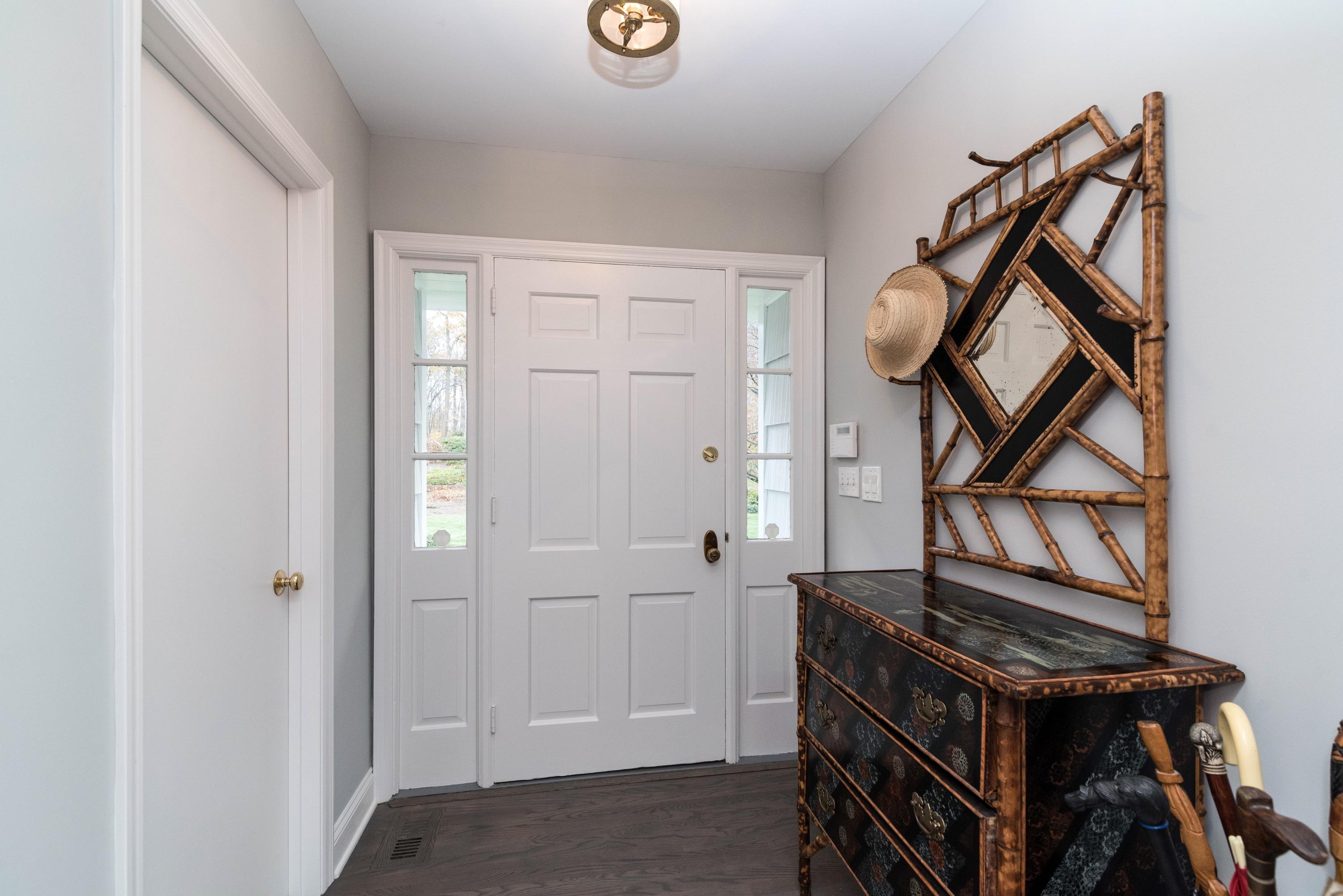 782 Smith Ridge Road New Canaan, CT 06840 - Photo 3 of 25 a view of an entryway with wooden floor