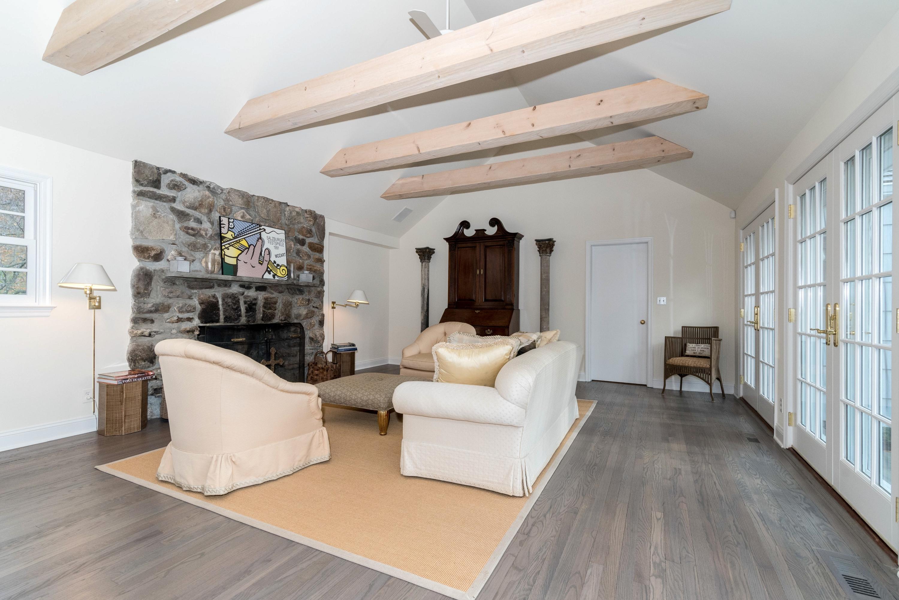 782 Smith Ridge Road New Canaan, CT 06840 - Photo 5 of 25 a living room with furniture and a wooden floor