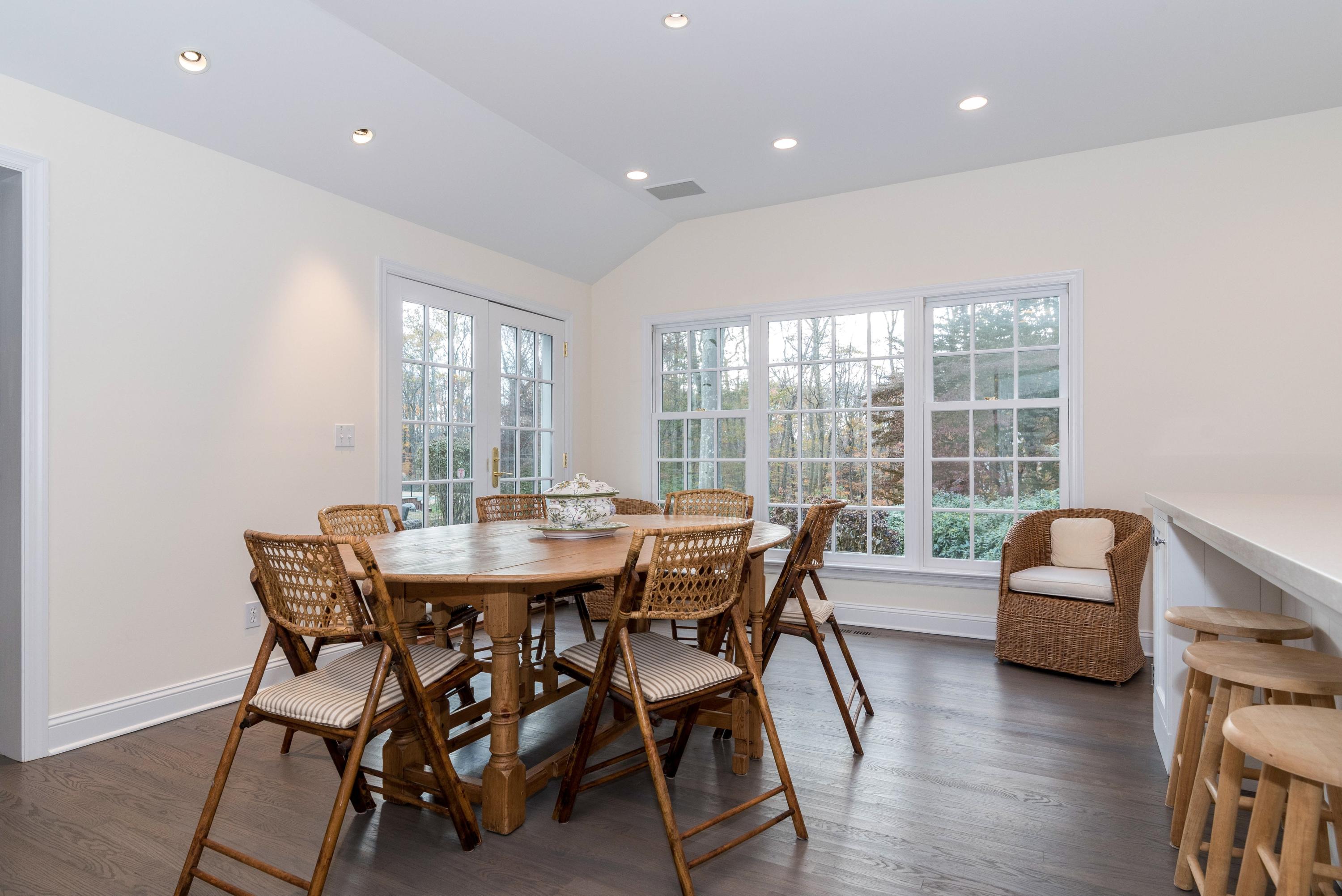 782 Smith Ridge Road New Canaan, CT 06840 - Photo 8 of 25 a view of a dining room with furniture window and wooden floor