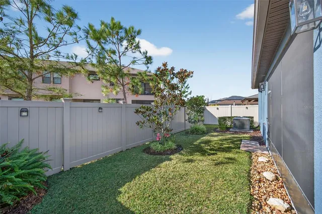 a view of a park with slide and bench