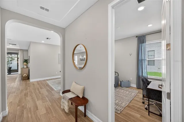 a workspace with furniture and a window