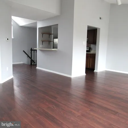 a hallway with washer and dryer