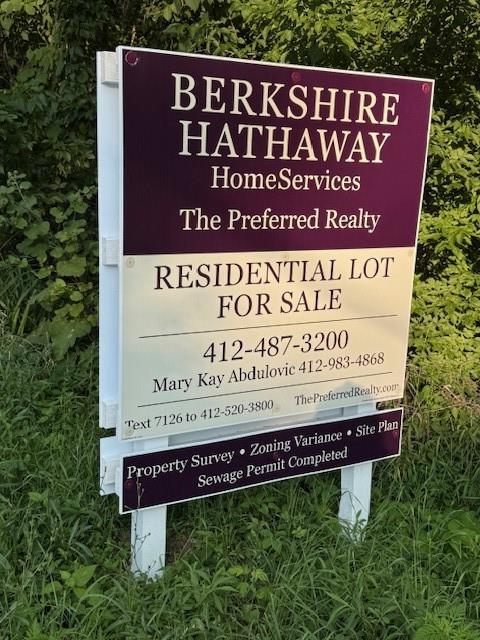 a sign on the wooden wall