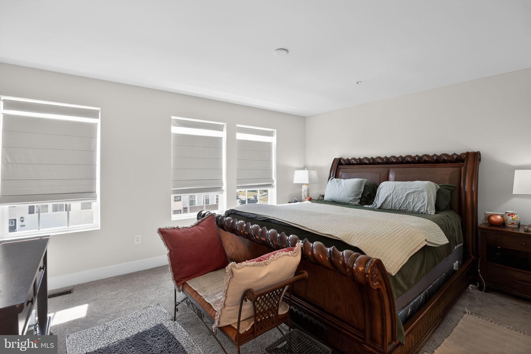 23609 Crosswinds Way California, MD 20619 - Photo 19 of 29 a bedroom with a bed chair and window