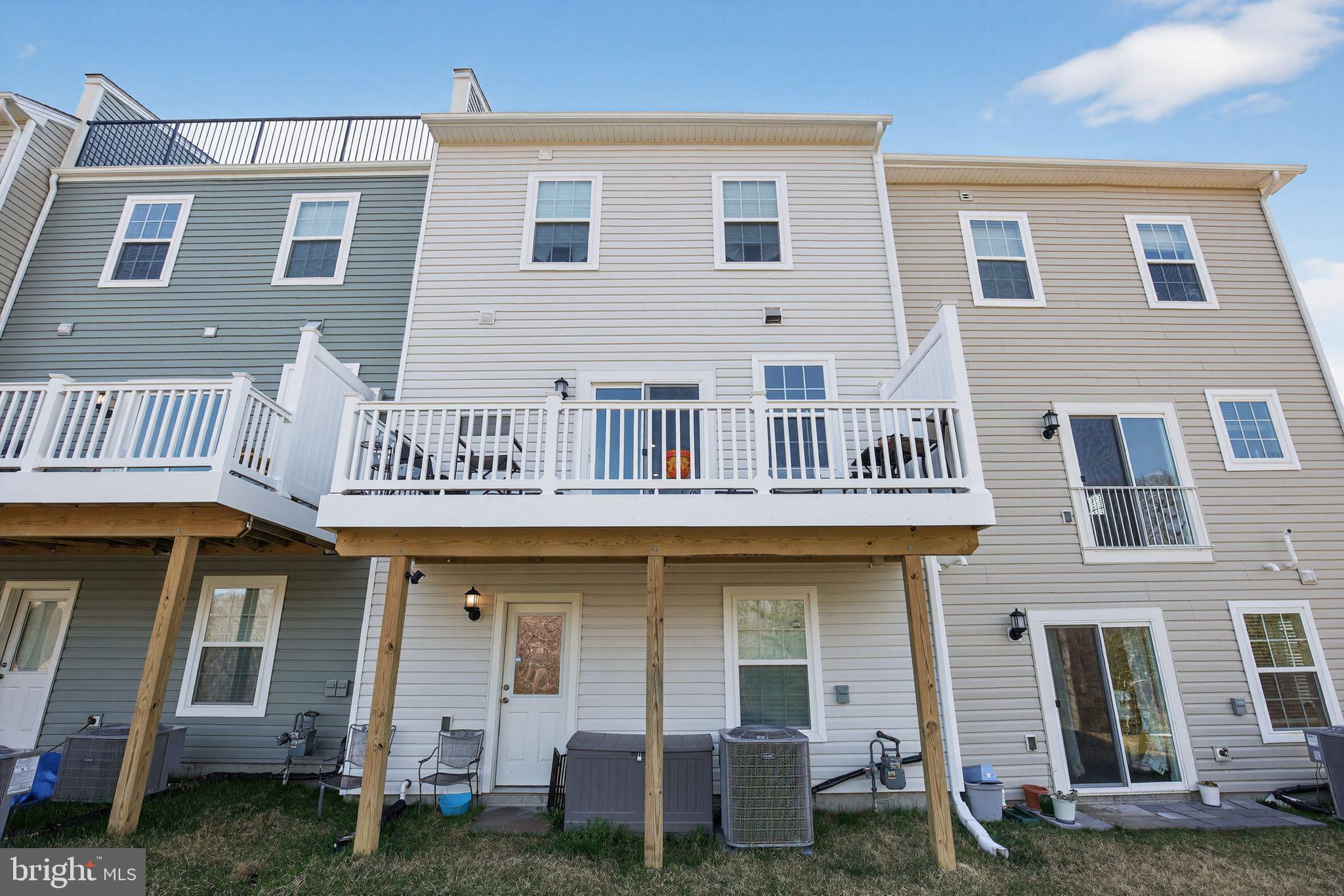 23609 Crosswinds Way California, MD 20619 - Photo 28 of 29 a front view of a house with a yard