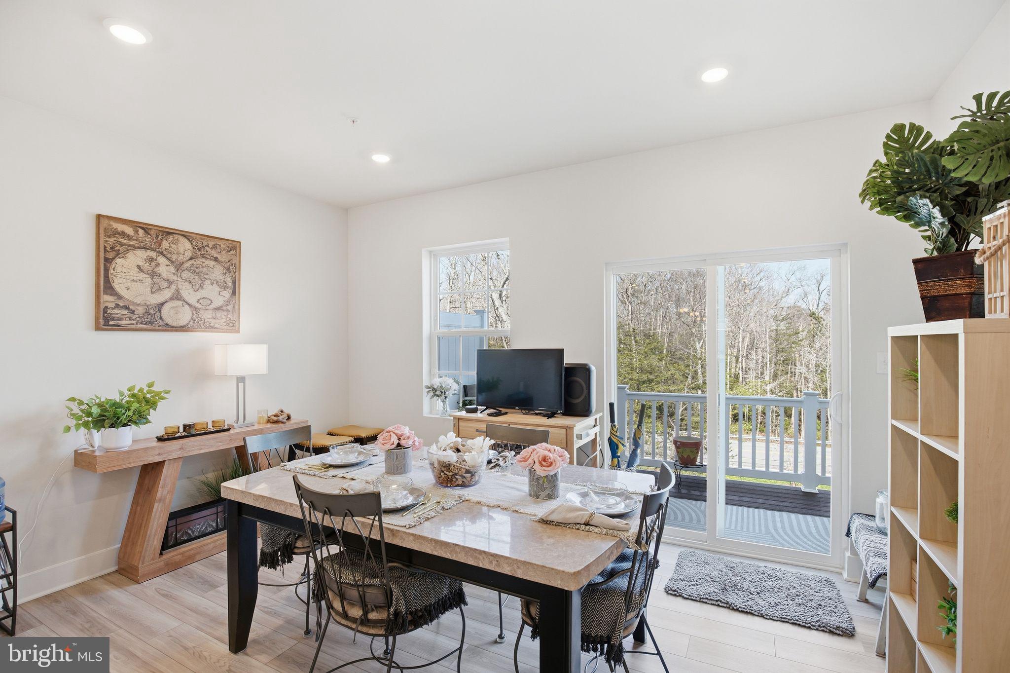 23609 Crosswinds Way California, MD 20619 - Photo 10 of 29 a view of a dining room with furniture window and outside view