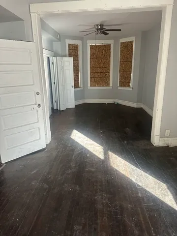 an empty room with windows