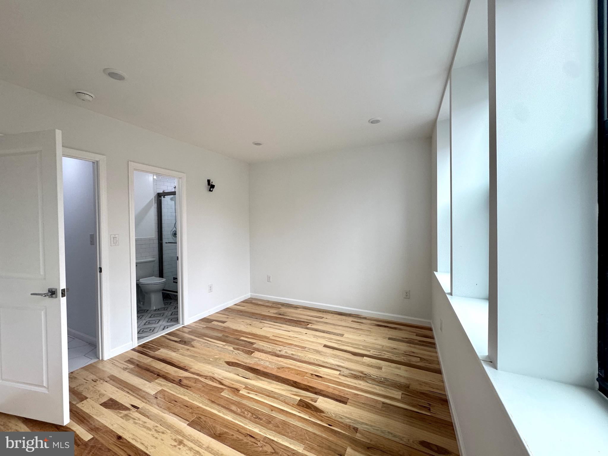 781 South 3rd Street, Unit 2 Philadelphia, PA 19147 - Photo 7 of 17 a bedroom with a bed and a walk in closet