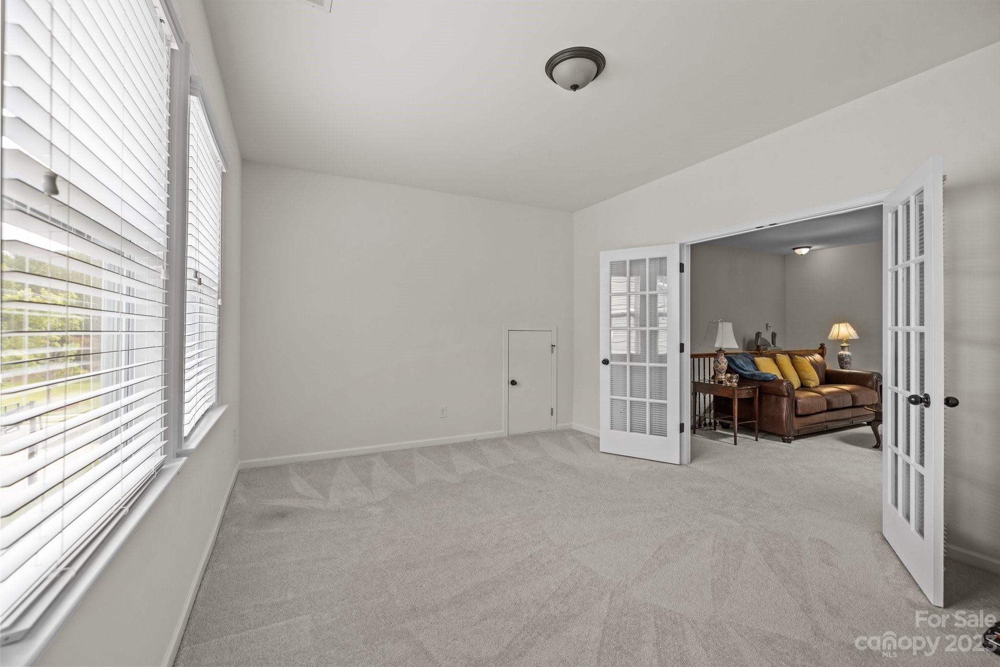 141 Hawks Creek Parkway Fort Mill, SC 29708 - Photo 28 of 44 a view of a livingroom with couch and a window