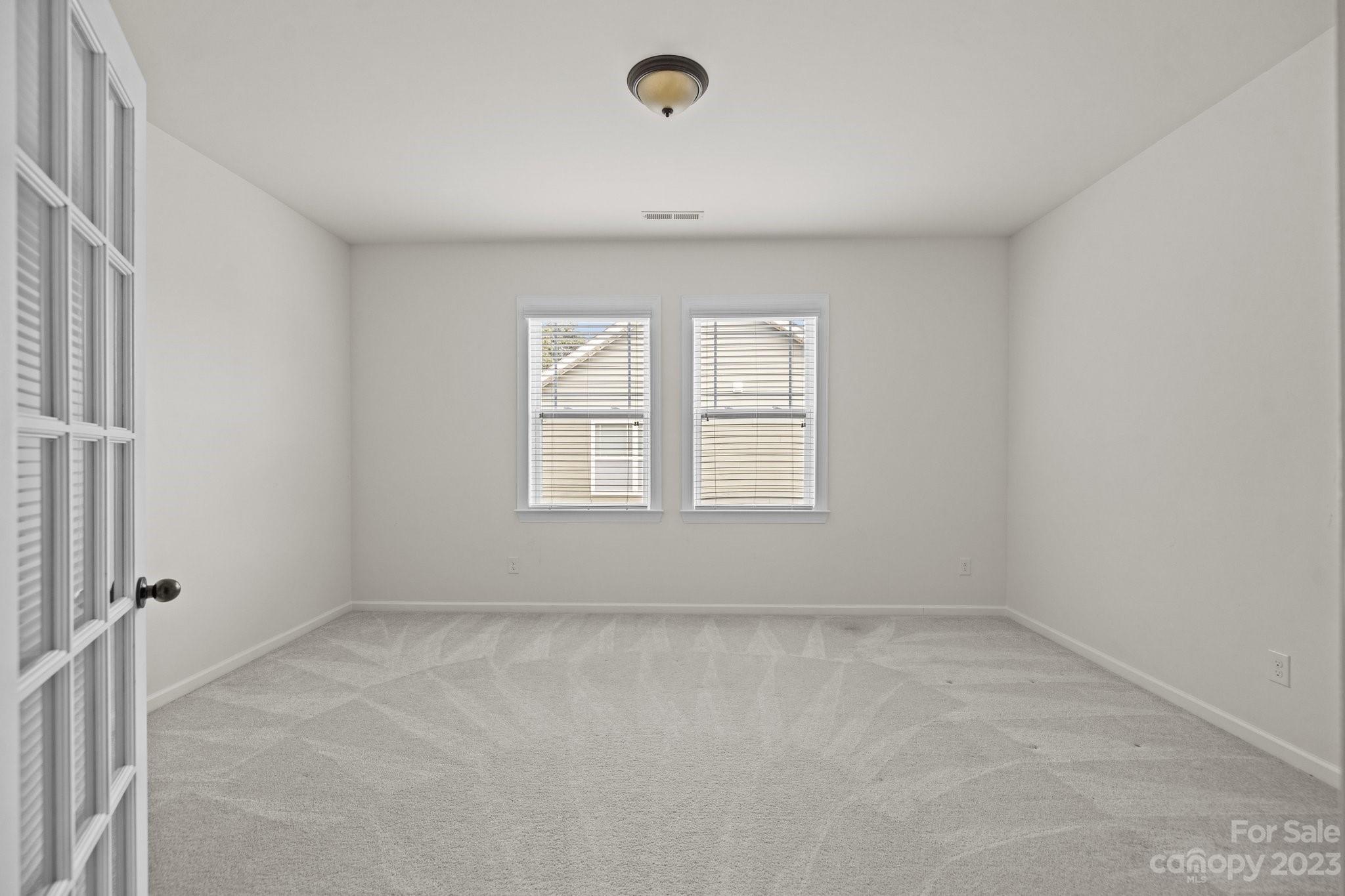 141 Hawks Creek Parkway Fort Mill, SC 29708 - Photo 29 of 44 an empty room with windows