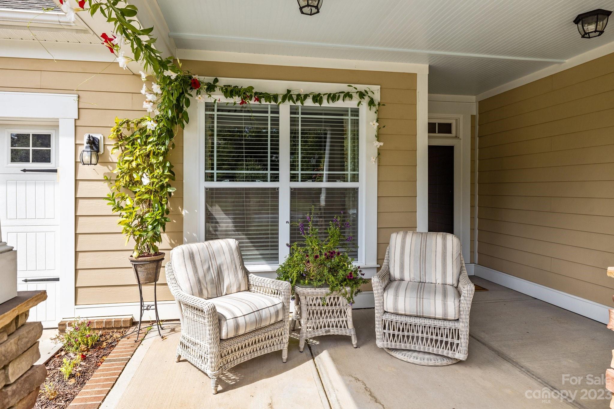 141 Hawks Creek Parkway Fort Mill, SC 29708 - Photo 30 of 44 a balcony with furniture and a potted plant
