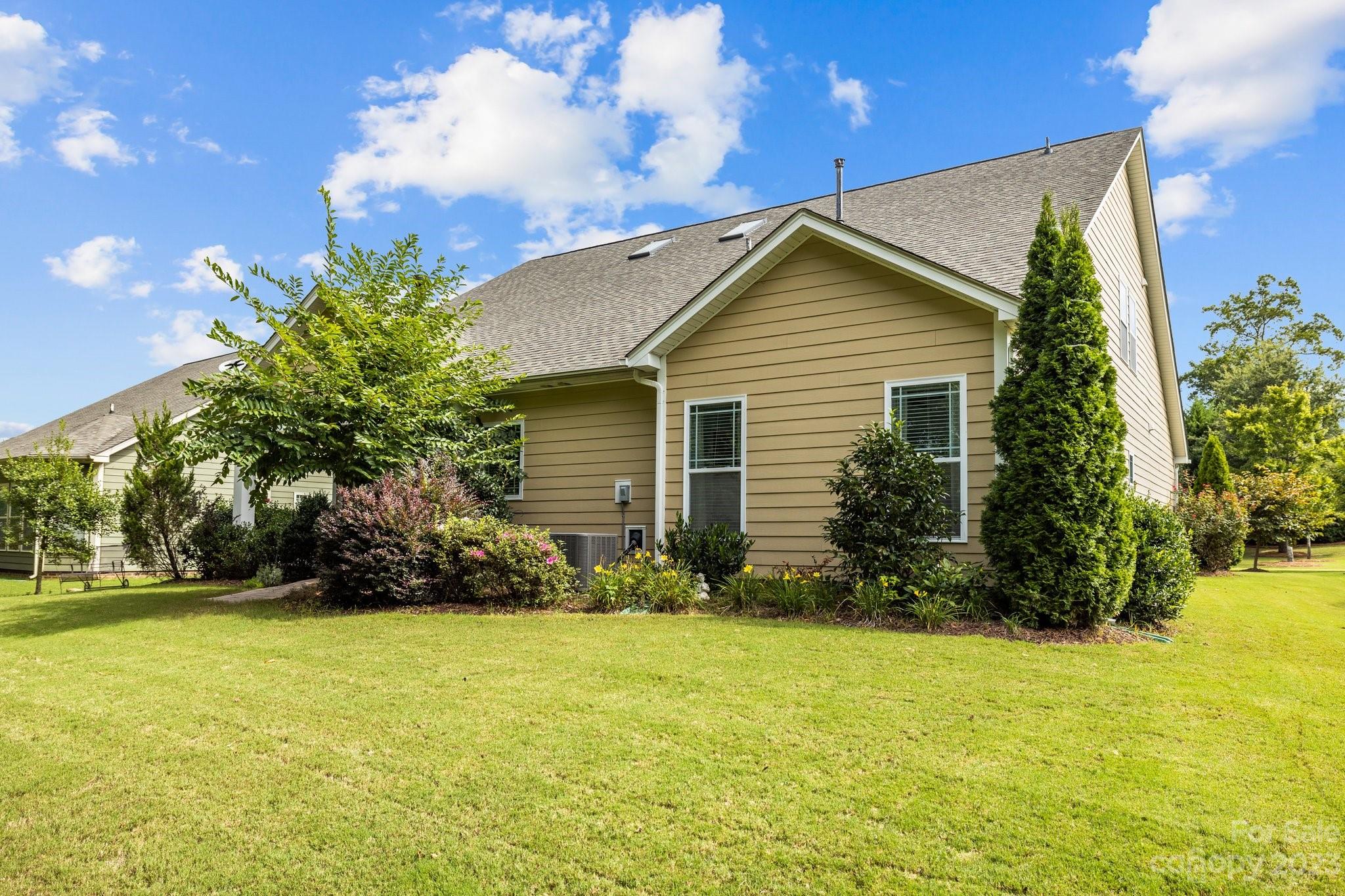 141 Hawks Creek Parkway Fort Mill, SC 29708 - Photo 32 of 44 a front view of house with yard and trees