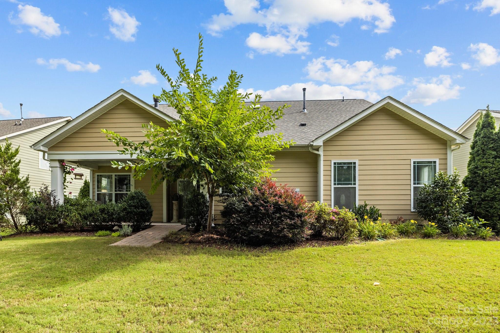 141 Hawks Creek Parkway Fort Mill, SC 29708 - Photo 33 of 44 a front view of house with yard and green space