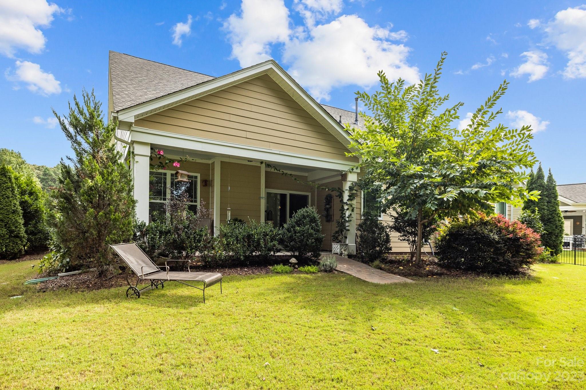 141 Hawks Creek Parkway Fort Mill, SC 29708 - Photo 34 of 44 a view of a house with swimming pool and sitting area