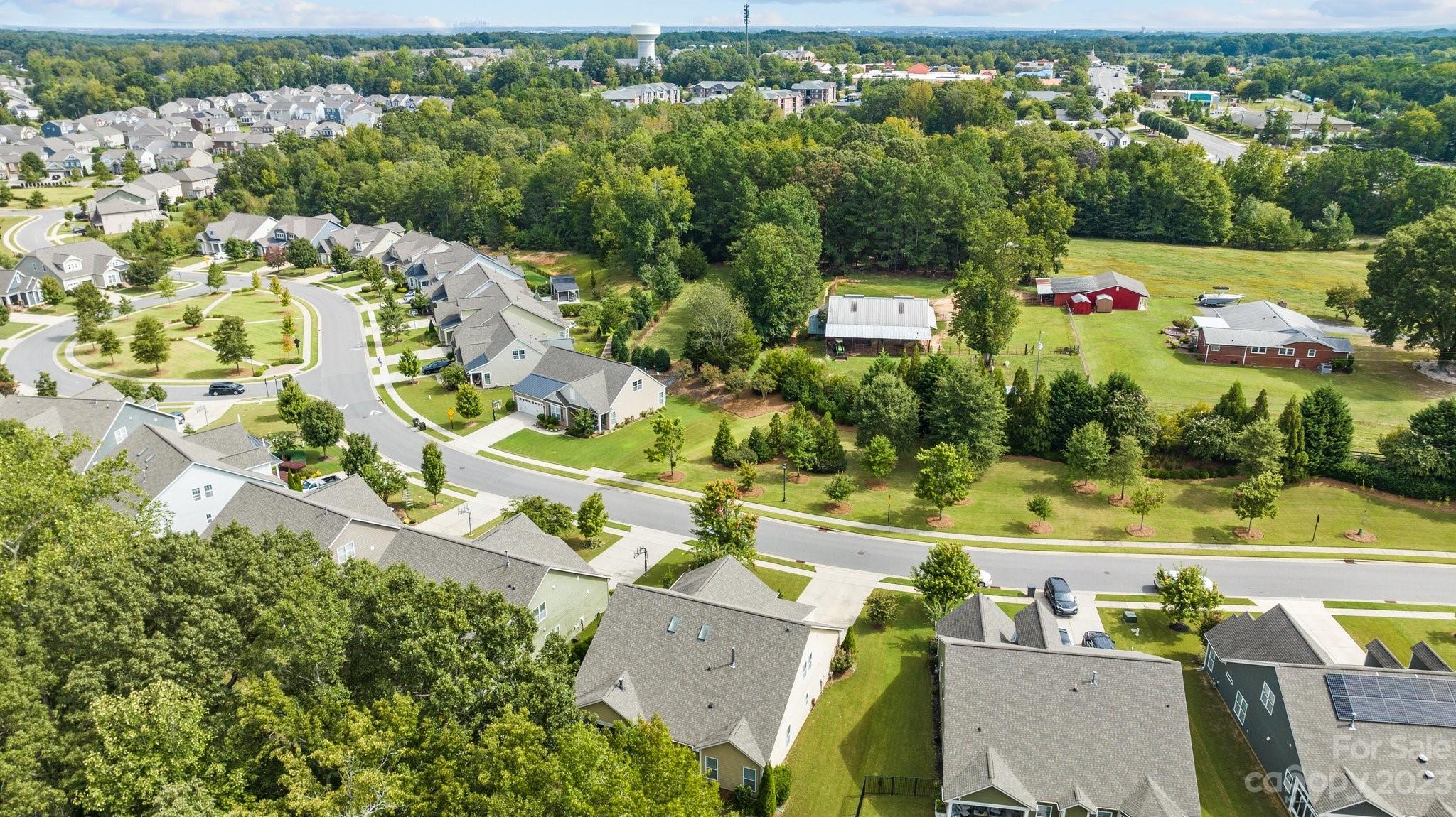 141 Hawks Creek Parkway Fort Mill, SC 29708 - Photo 41 of 44 an aerial view of residential houses with outdoor space and trees all around