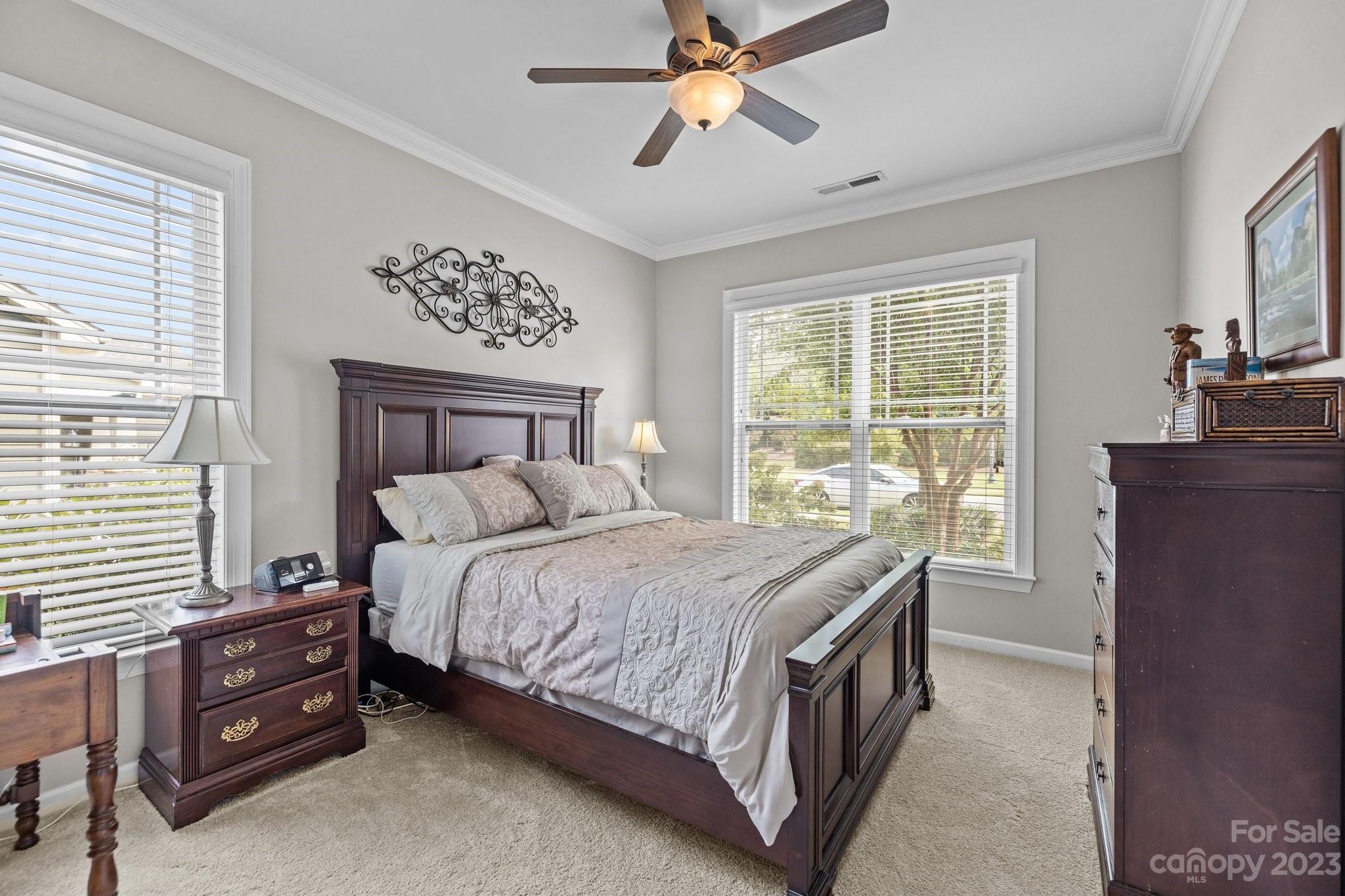 141 Hawks Creek Parkway Fort Mill, SC 29708 - Photo 6 of 44 a bedroom with a bed and a desk