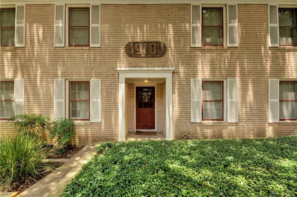 910 East 32nd Street, Unit 101 Austin, TX 78705 - Photo 1 of 1 a front view of a house with a yard