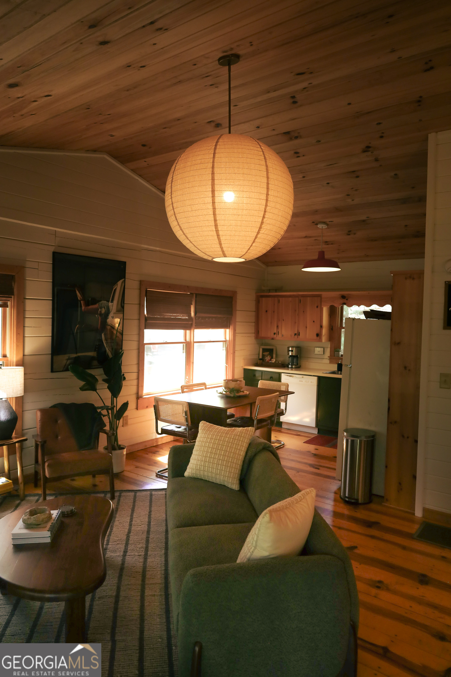7 Ascherman Court Blue Ridge, GA 30513 - Photo 17 of 41 a living room with furniture a dining table and chairs with wooden floor