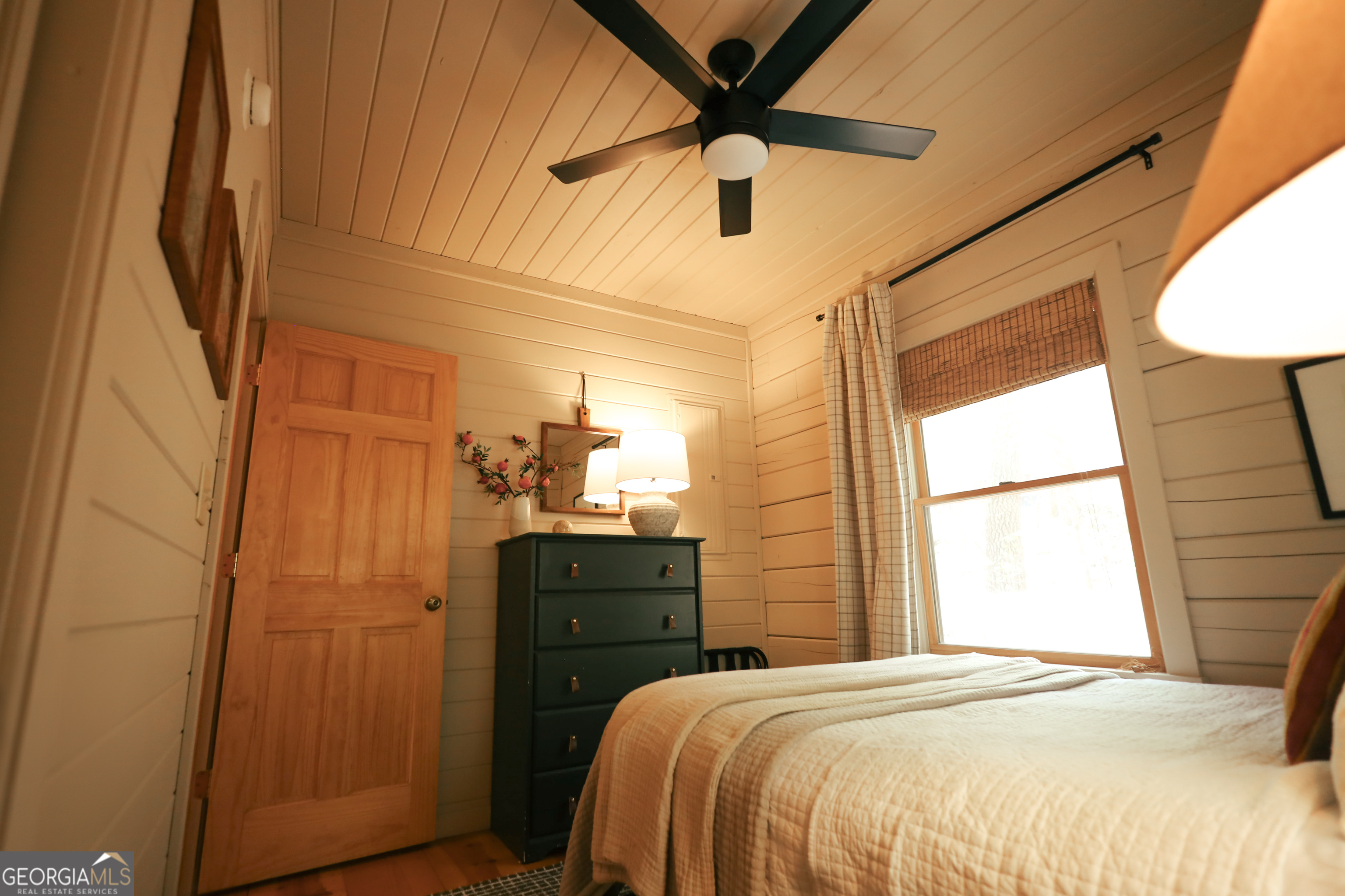 7 Ascherman Court Blue Ridge, GA 30513 - Photo 24 of 41 a bedroom with a bed and a window