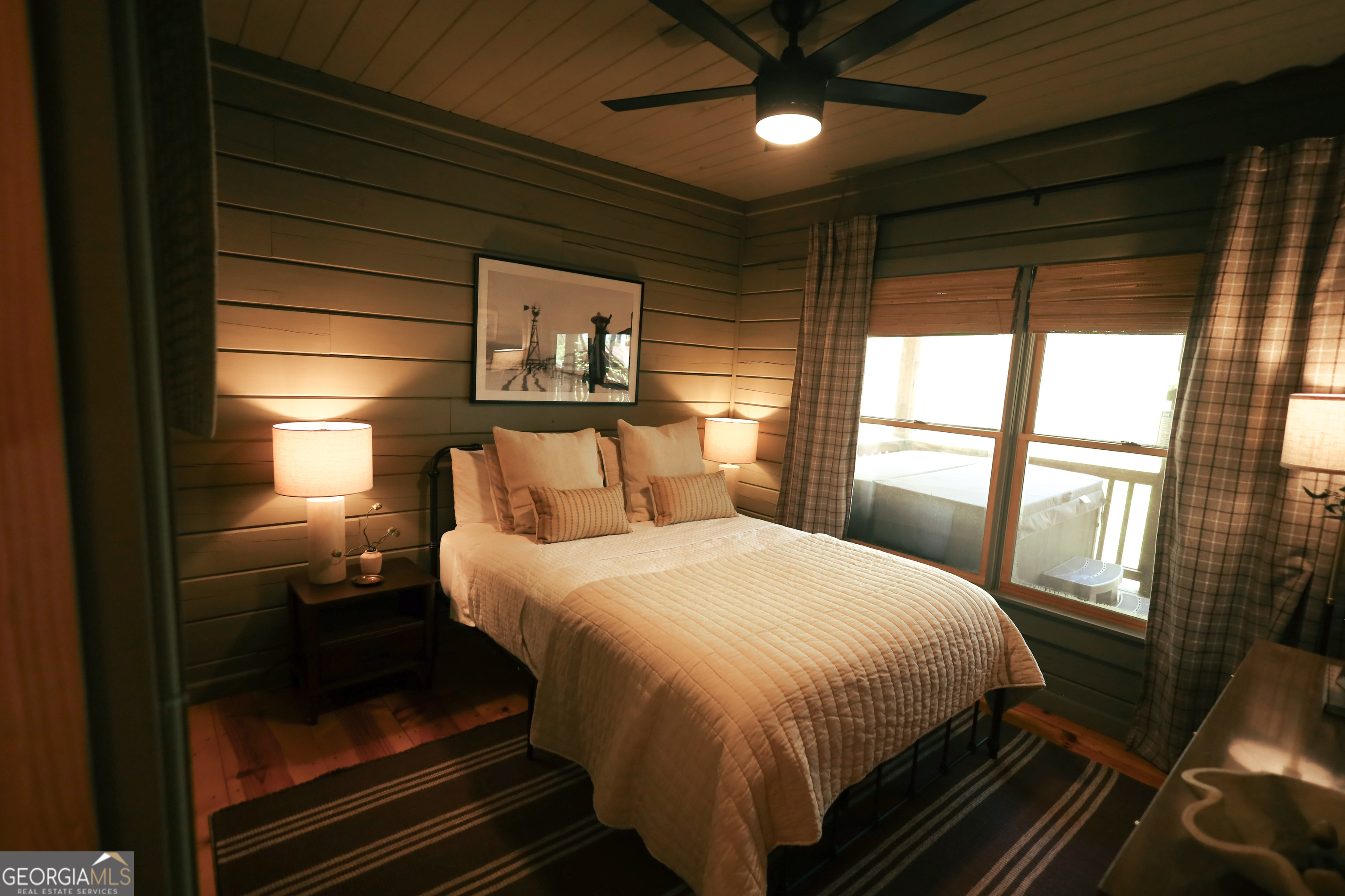 7 Ascherman Court Blue Ridge, GA 30513 - Photo 26 of 41 a bedroom with a bed and wooden floor