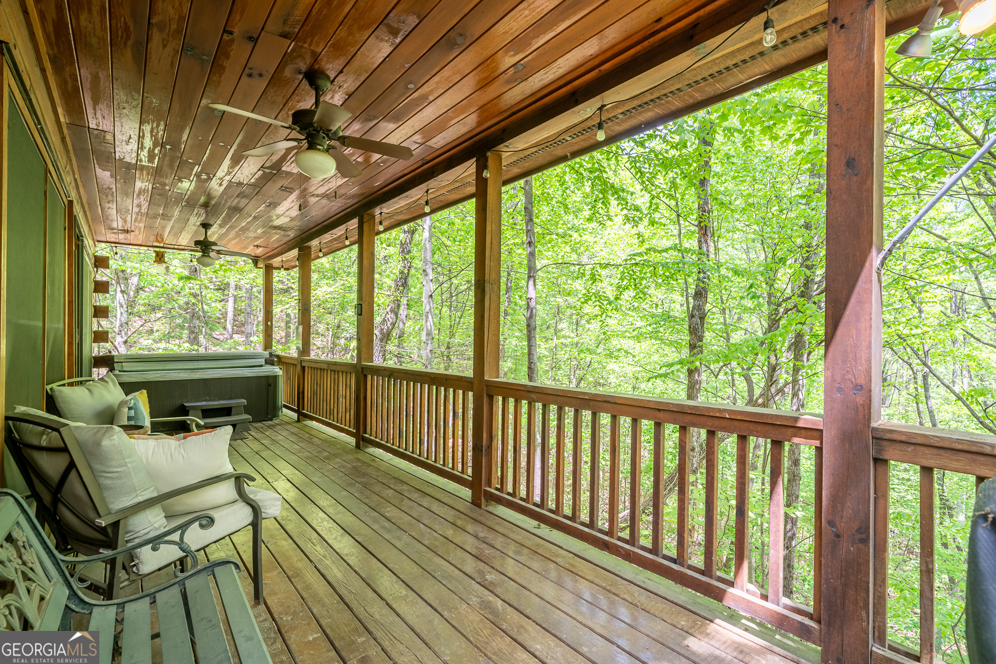 7 Ascherman Court Blue Ridge, GA 30513 - Photo 35 of 41 a balcony with wooden floor and outdoor seating