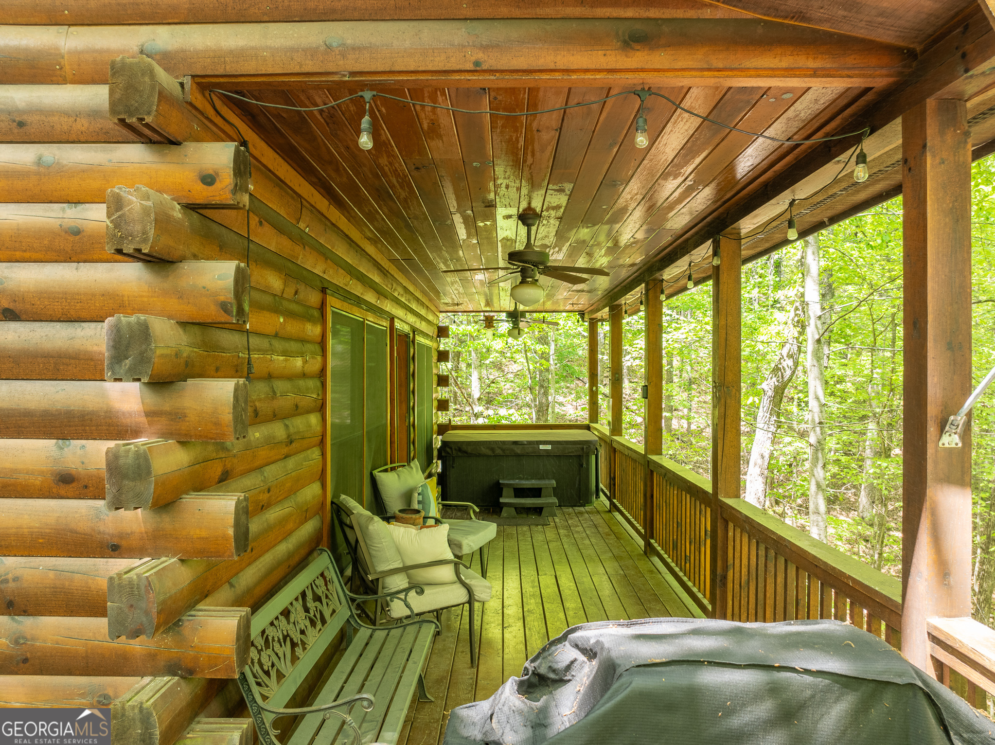 7 Ascherman Court Blue Ridge, GA 30513 - Photo 37 of 41 a view of a balcony with table and chairs