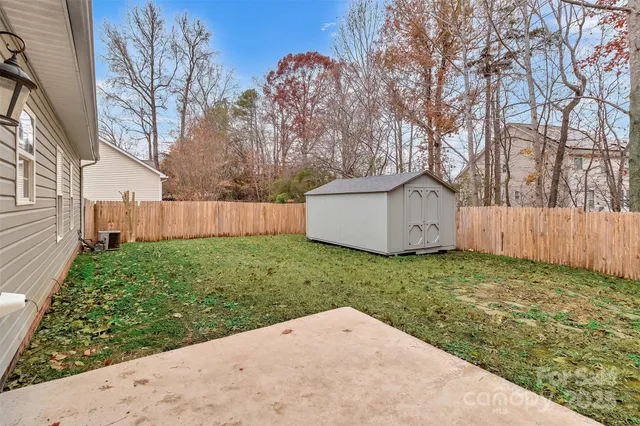 a backyard of a house with lots of green space