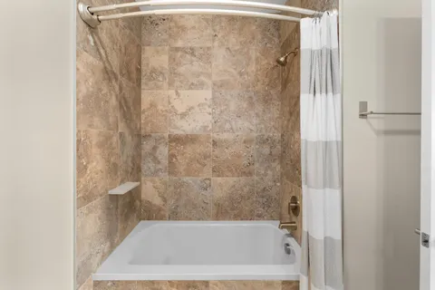 a bathroom with a bathtub
