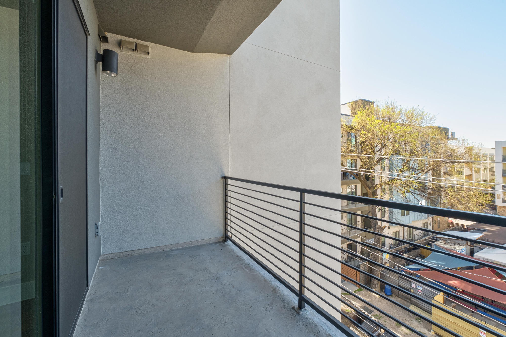 1615 East 7th Street, Unit 402 Austin, TX 78702 - Photo 19 of 23 a view of a balcony with city view