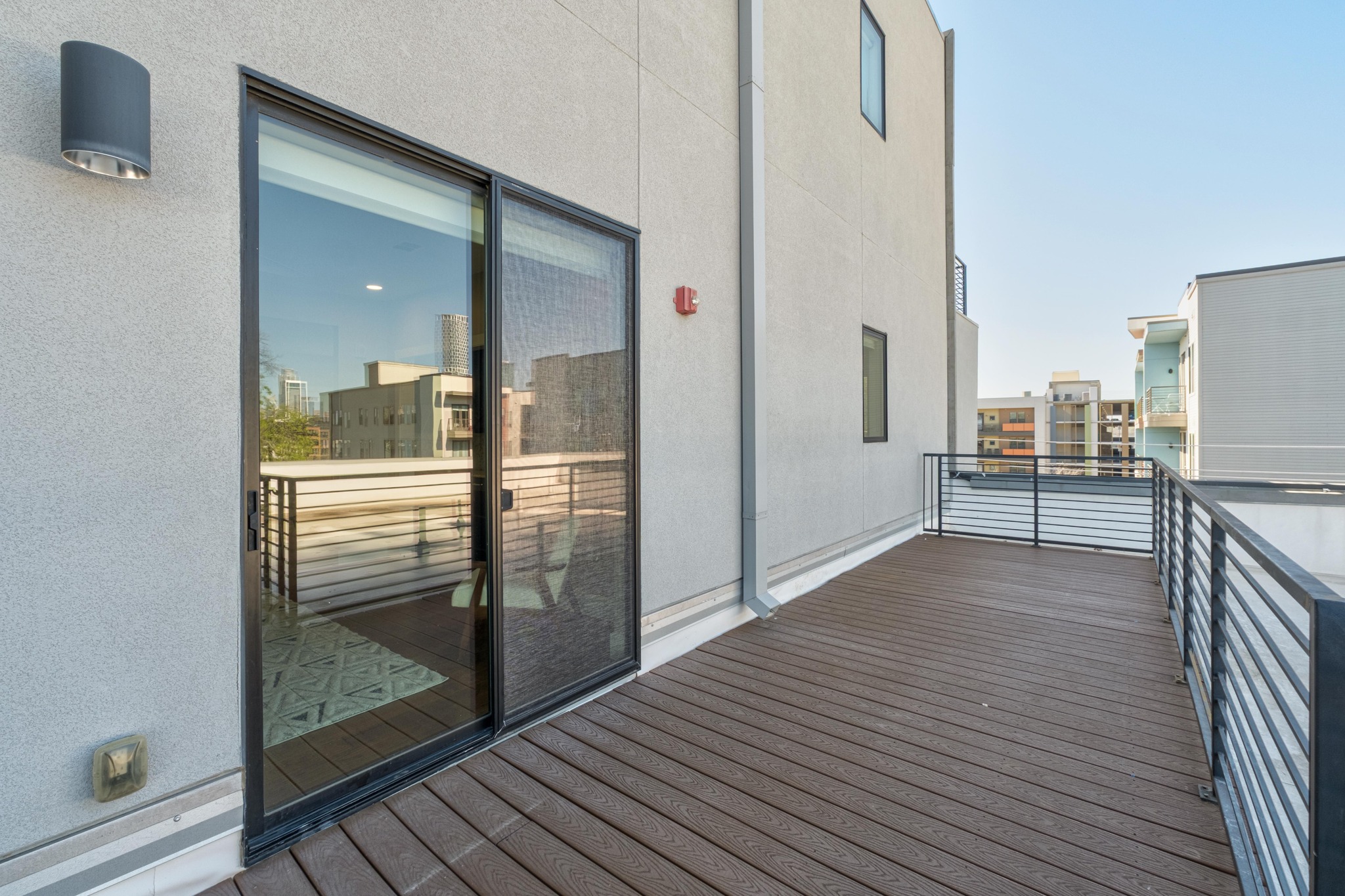1615 East 7th Street, Unit 402 Austin, TX 78702 - Photo 21 of 23 a view of a hallway view with wooden floor