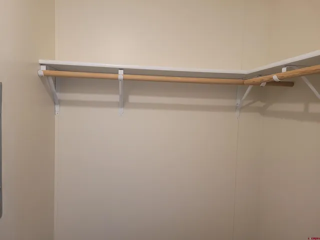 a view of balcony with wooden floor