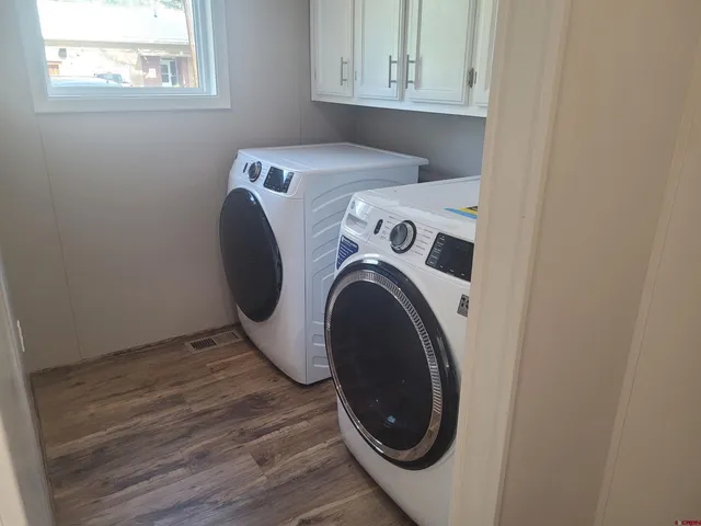 a view of balcony with wooden floor