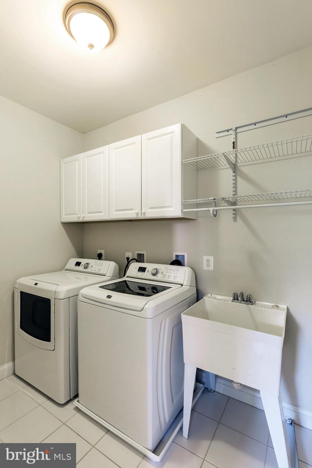 9215 Bells Mill Road Potomac, MD 20854 - Photo 17 of 35 Laundry Room conveniently located between Bedrooms