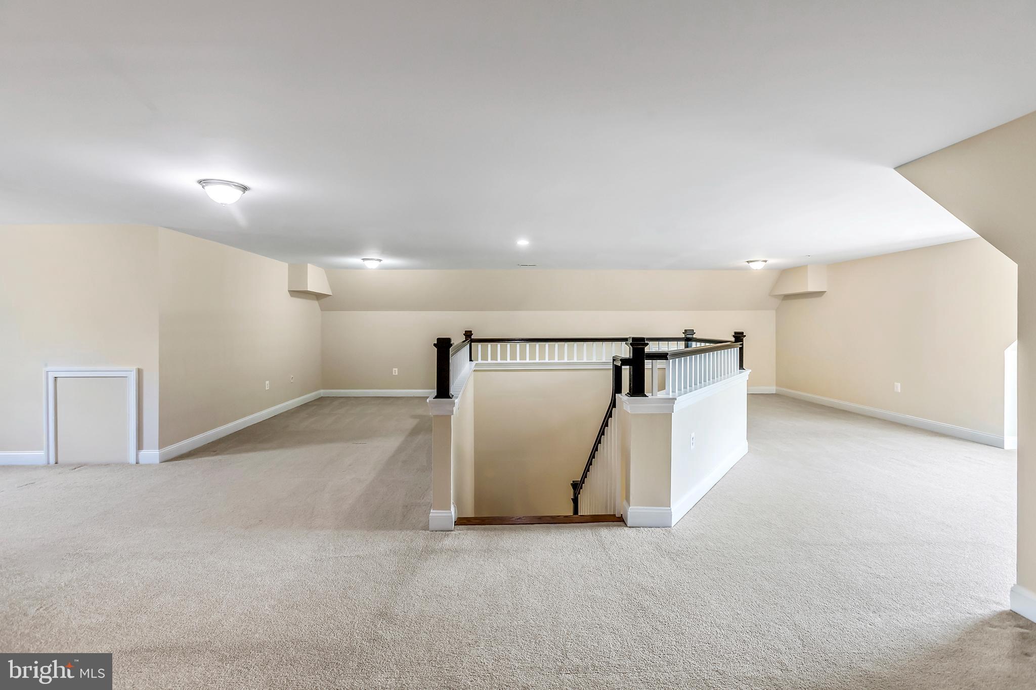 9215 Bells Mill Road Potomac, MD 20854 - Photo 23 of 35 Vast Sitting Area + Office with Front + Back Views