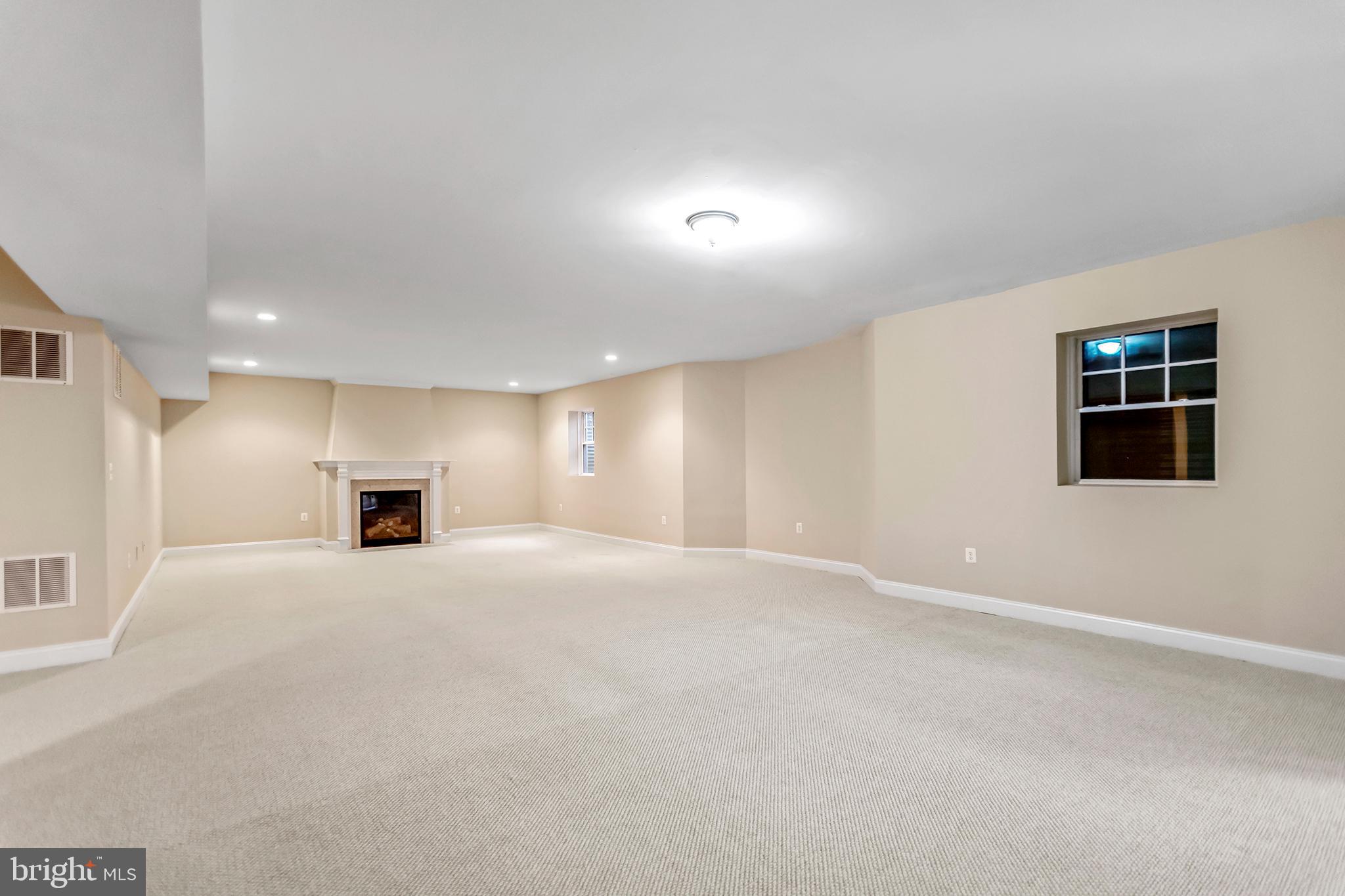 9215 Bells Mill Road Potomac, MD 20854 - Photo 26 of 35 Basement Rec Room for Movie or Game Night