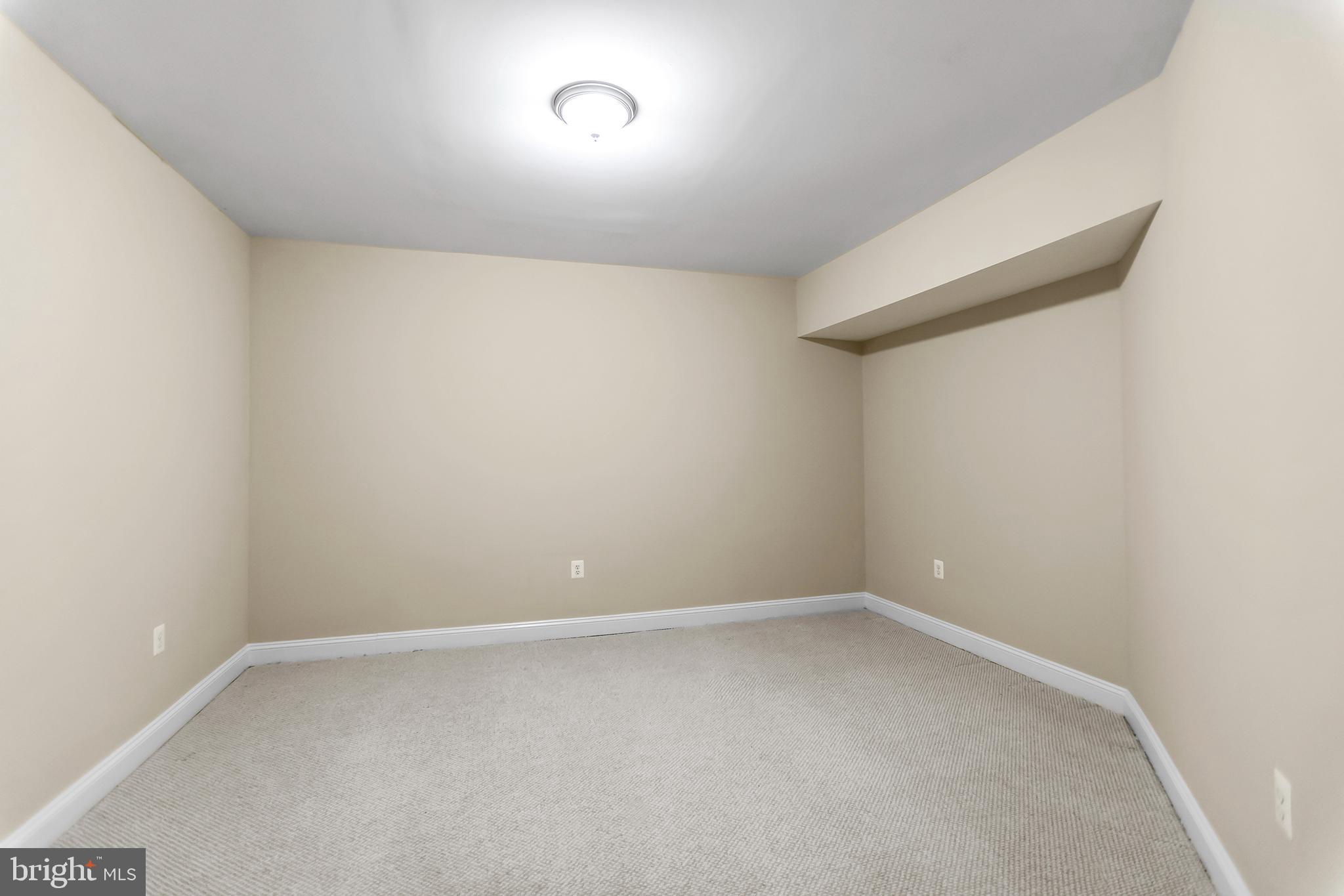 9215 Bells Mill Road Potomac, MD 20854 - Photo 27 of 35 Basement Media Room for Quiet Entertainment