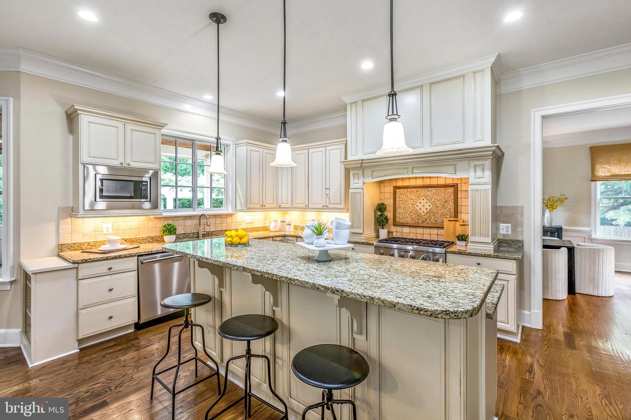 9215 Bells Mill Road Potomac, MD 20854 - Photo 7 of 35 Quick eats at the breakfast bar in the Kitchen