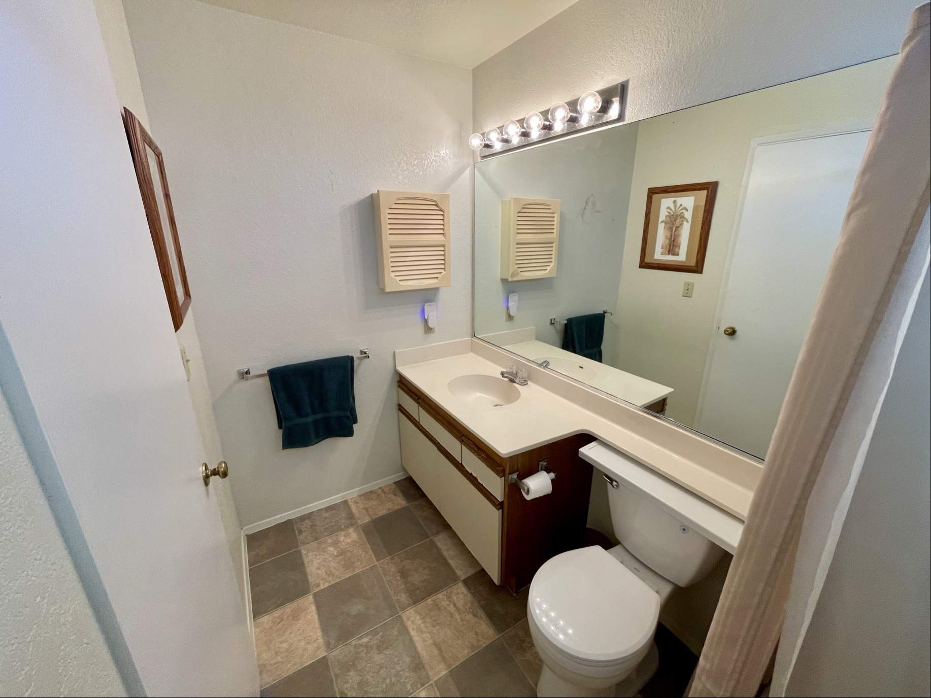 68-3883 Lua Kula Street, Unit 2005 Waikoloa, HI 96738 - Photo 21 of 28 a bathroom with a granite countertop toilet sink and mirror